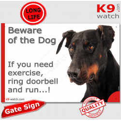 black and tan Dobermann, funny Portal Sign "Beware of the Dog, need exercise, ring & run" gate photo hilarious plate notice