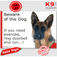 shorthaired German Shepherd, funny Portal Sign "Beware of the Dog, need exercise, ring & run" gate photo hilarious plate notice